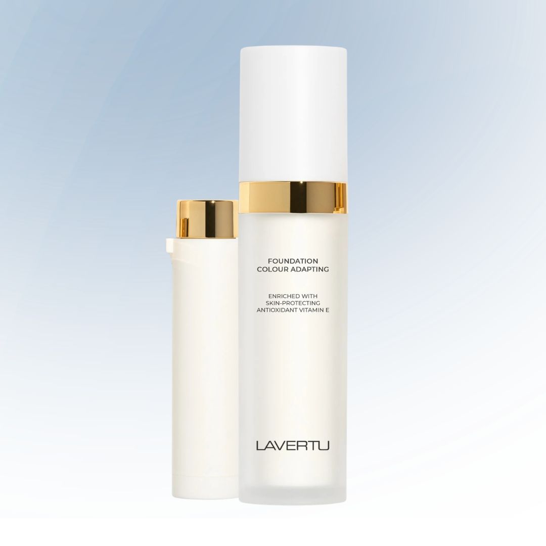 Two foundation bottles with gold caps and Lavertu branding on a white background.