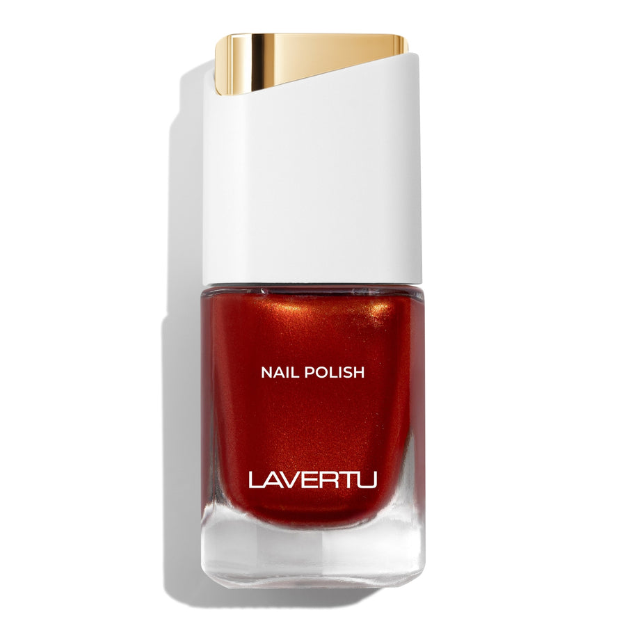 LAVERTU Nail Polish Unique 20 Lia Orange packshot featuring a warm copper orange nail colour with subtle shimmer, full coverage and glossy finish in a sleek glass bottle.