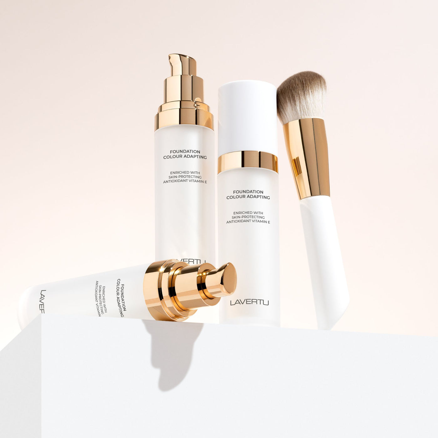 Lavertu colour adapting foundation with foundation brush in warm, natural light